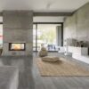 Katella Ash Luxury Vinyl Floor Planks in a modern living room with a fireplace.