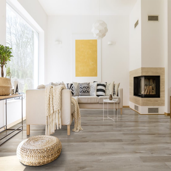 Santiago Luxury Vinyl Floor Planks used in a modern living room with a fireplace.