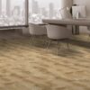 Rustic Apple 12mm Waterproof Laminate Flooring in an office with a view of a city.