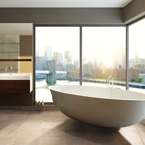 Tuscany Beige Travertine Tile in a bathroom with a cityscape view.