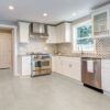 Sande Ivory Matte Porcelain Tile in a classic kitchen.