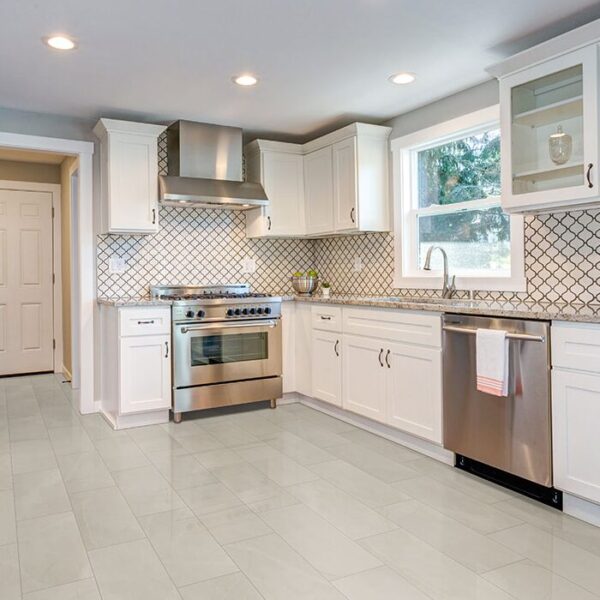 Sande Ivory Matte Porcelain Tile in a classic kitchen.