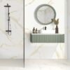 Eden Calcatta Matte Porcelain Tile in a bathroom with a floating sink.