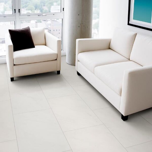 Aria Ice Polished Porcelain Tile 24" X 48" in a living room with 2 plush chairs.