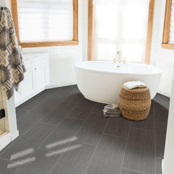 Graphite Focus Porcelain Tile 12" X 24" in a bathroom with a tub