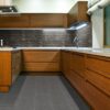 Graphite Focus Porcelain Tile 12" X 24" installed in a kitchen.