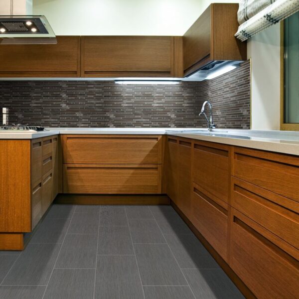 Graphite Focus Porcelain Tile 12" X 24" installed in a kitchen.