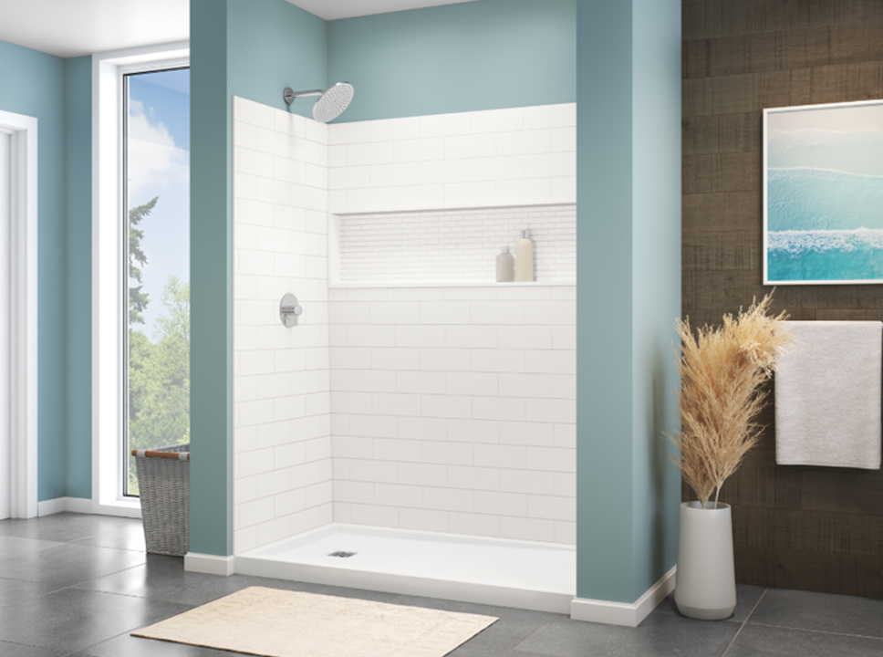 White shower tile in a blue bathroom
