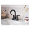 Mikah Matte black two-handle high arc bathroom faucet lifestyle